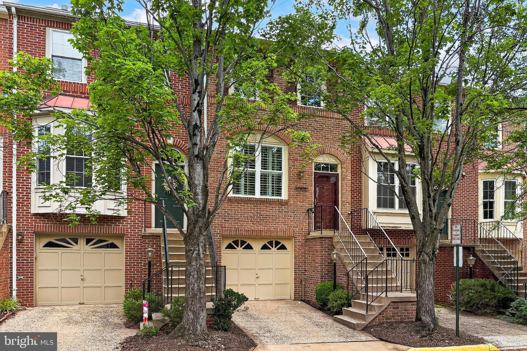 13157 Kidwell Field Road Herndon, VA 20171 - Photo 1 of 50 Charming brick townhouse with greenery.