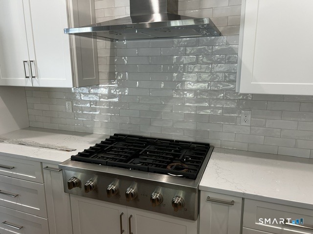 35 Village Circle, Unit 35 Hamden, CT 06514 - Photo 14 of 14 a stove top oven sitting inside of a kitchen