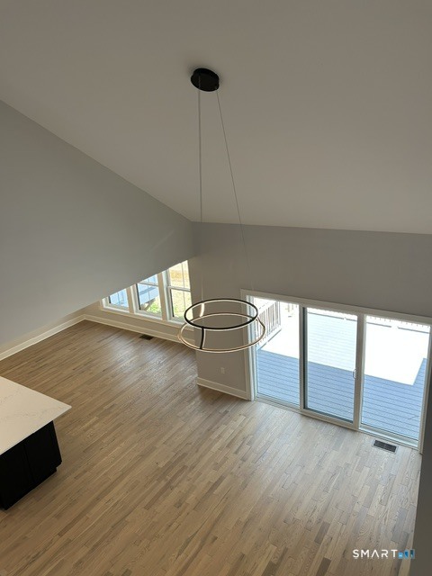 35 Village Circle, Unit 35 Hamden, CT 06514 - Photo 10 of 14 a view of a room with wooden floor