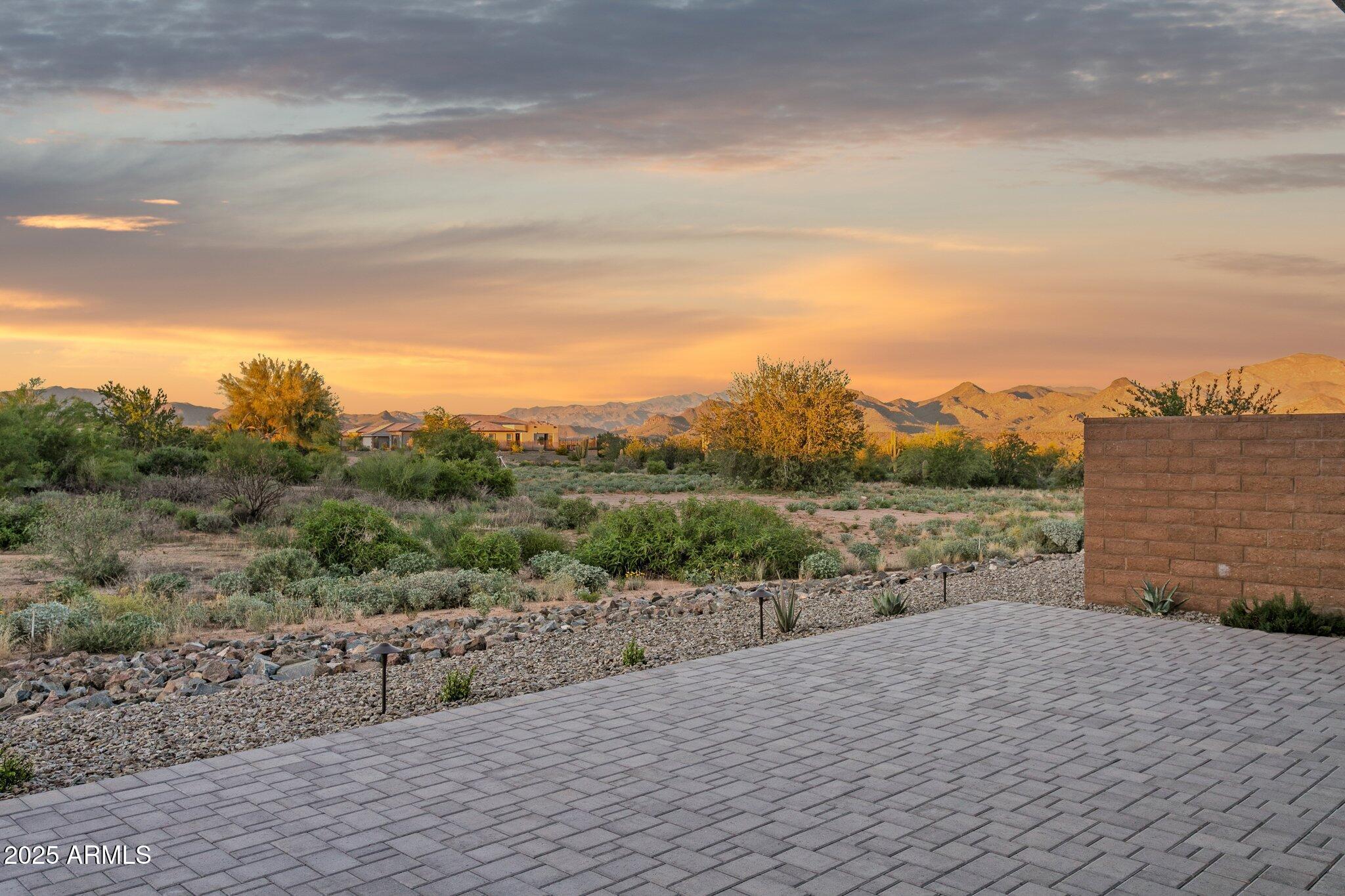 18324 East Spring Valley Court Rio Verde, AZ 85263 - Photo 27 of 39 a view of a terrace with a garden