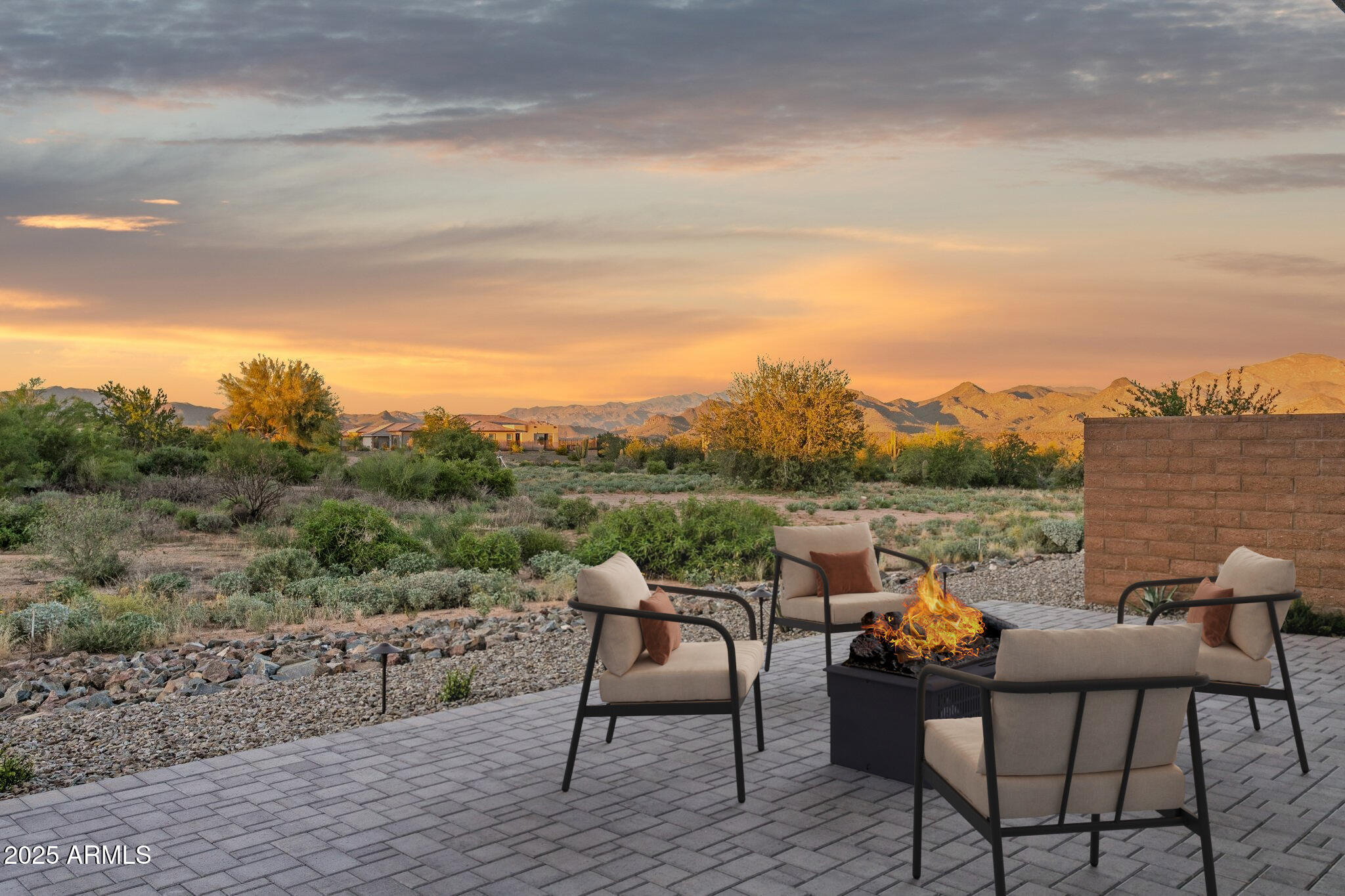 18324 East Spring Valley Court Rio Verde, AZ 85263 - Photo 2 of 39 a view of a terrace with couches and wooden floor