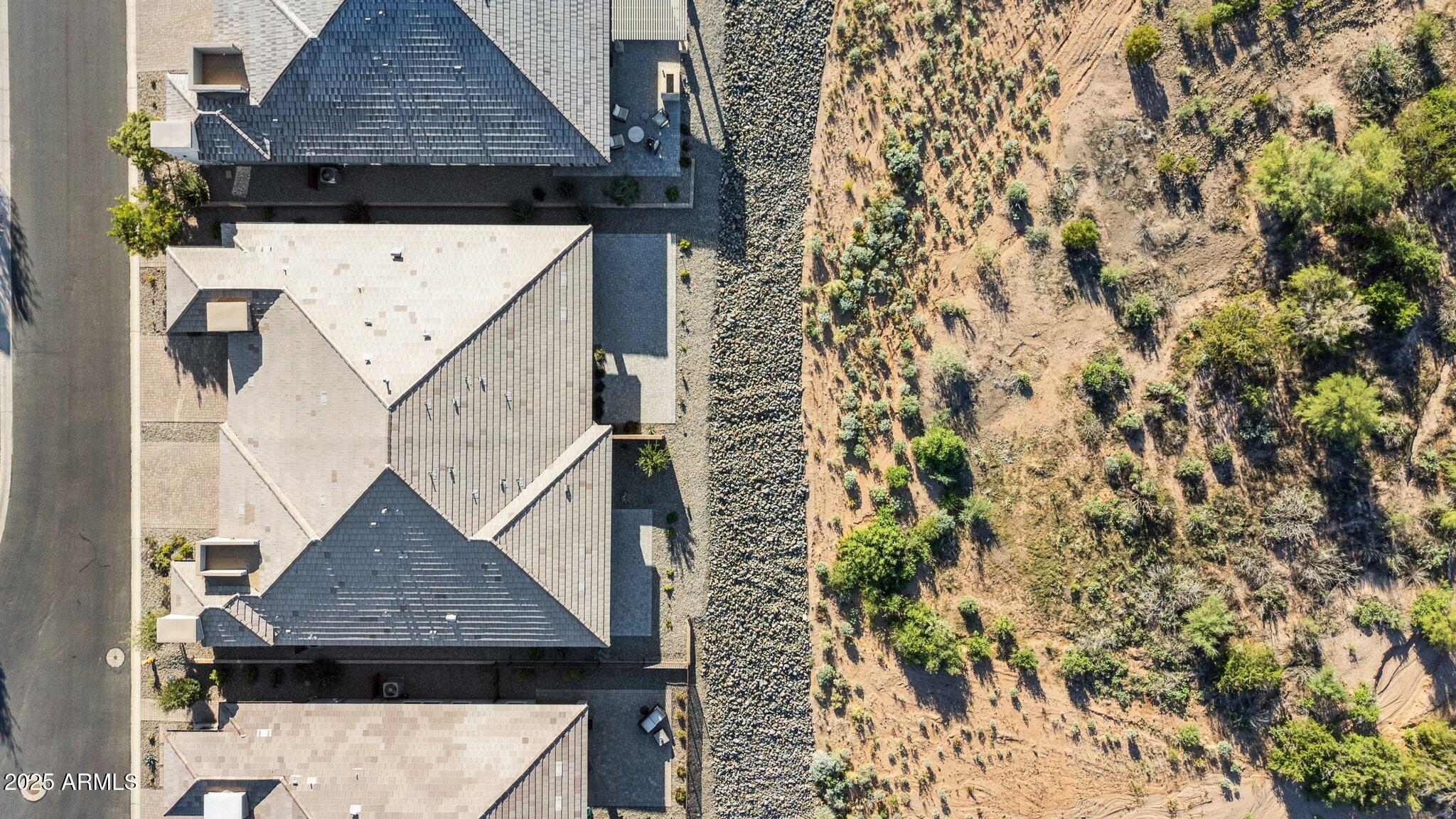18324 East Spring Valley Court Rio Verde, AZ 85263 - Photo 30 of 39 an aerial view of a house with a yard
