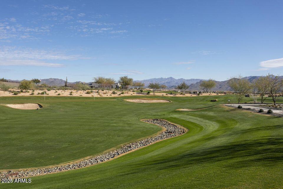 18324 East Spring Valley Court Rio Verde, AZ 85263 - Photo 34 of 39 a view of a grassy field with an ocean view