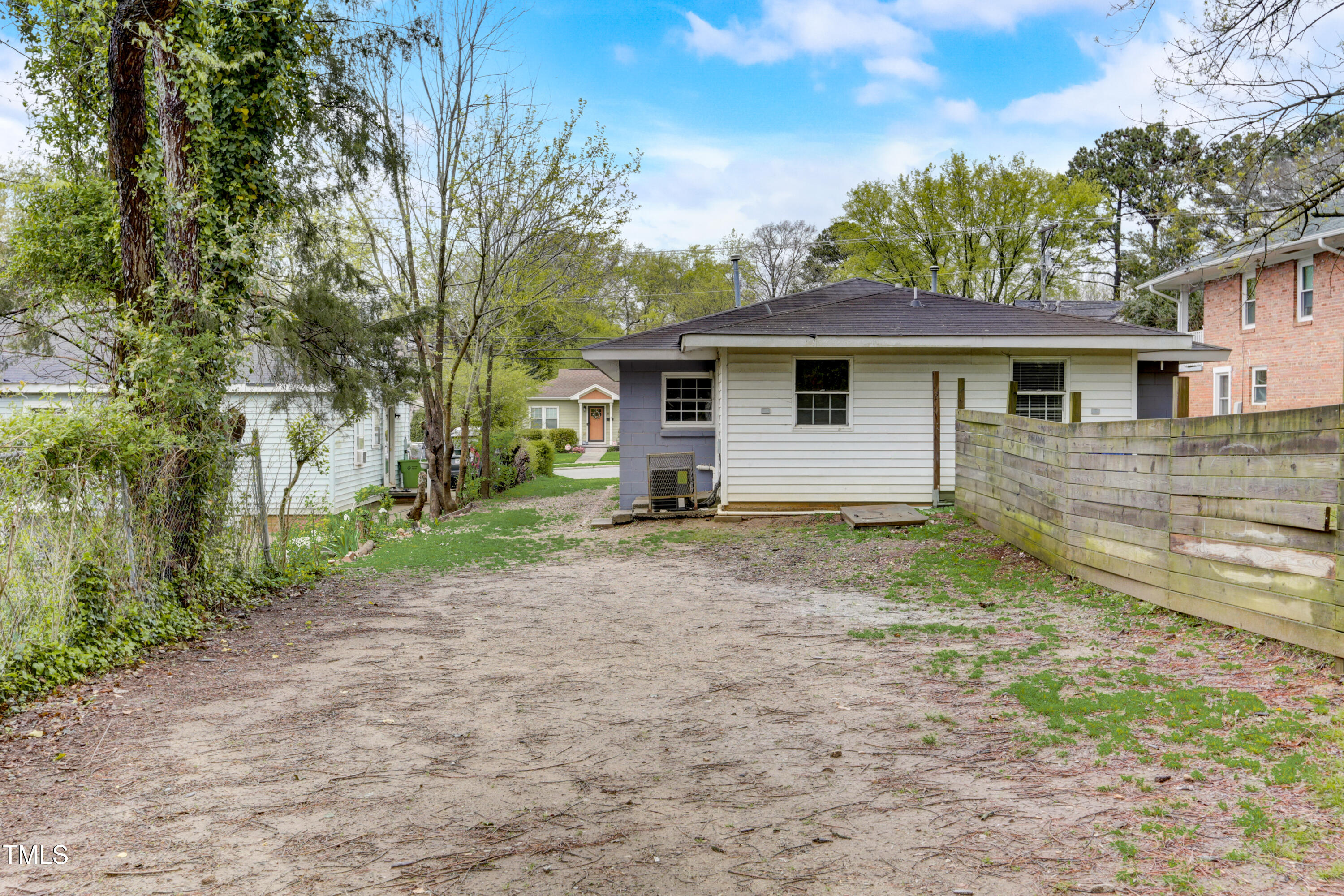 830 Lenoir Street Raleigh, NC 27601 - Photo 14 of 15 a view of a house with a yard