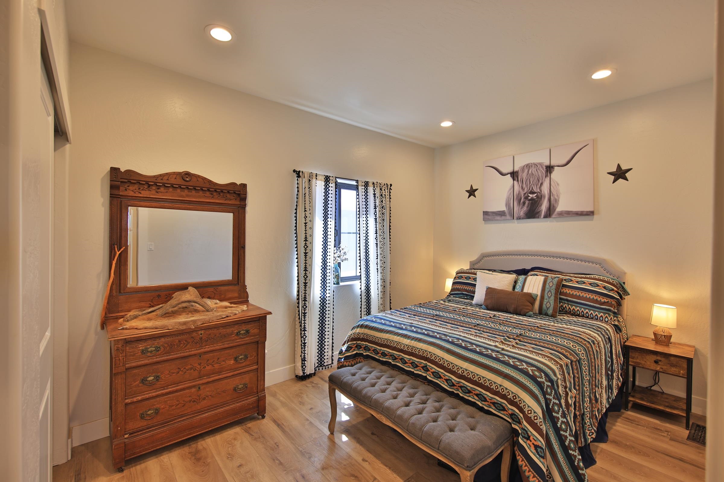 58749 Oe Road Collbran, CO 81624 - Photo 21 of 42 a bedroom with a bed and a window