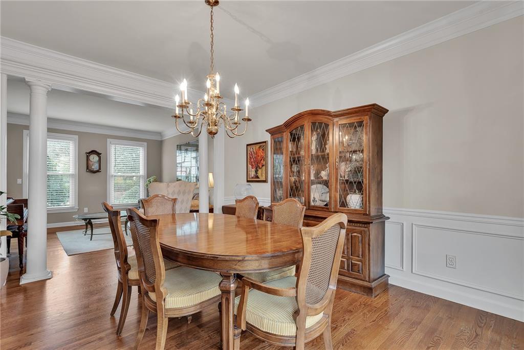 520 Fawn Run Alpharetta, GA 30005 - Photo 14 of 65 a view of a dining room with furniture and wooden floor
