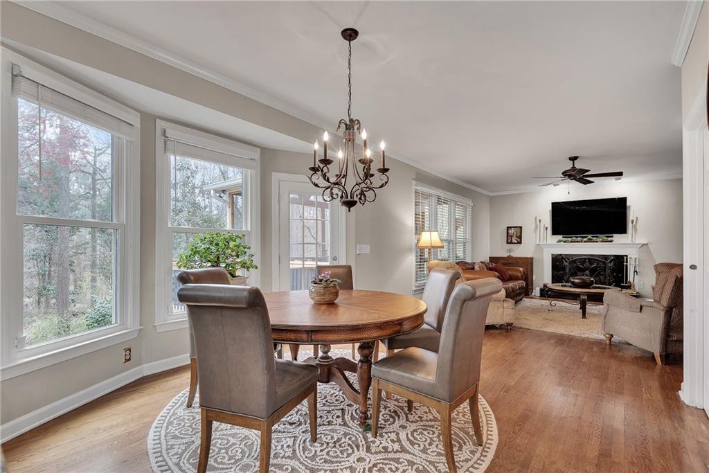 520 Fawn Run Alpharetta, GA 30005 - Photo 20 of 65 a view of a dining room with furniture window and wooden floor