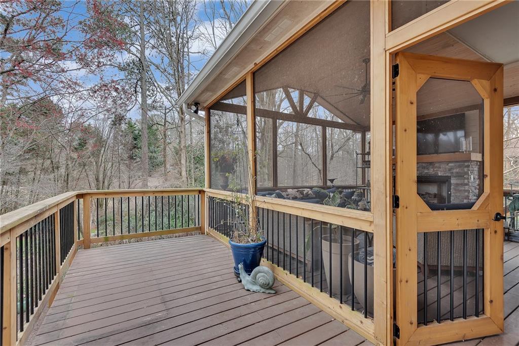 520 Fawn Run Alpharetta, GA 30005 - Photo 23 of 65 a view of a balcony with wooden floor and fence