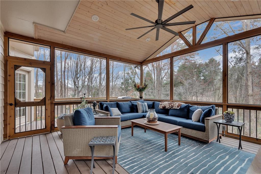 520 Fawn Run Alpharetta, GA 30005 - Photo 26 of 65 a living room with furniture and a large window