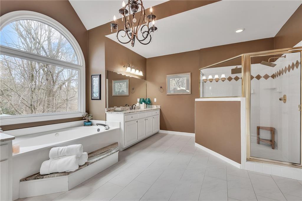 520 Fawn Run Alpharetta, GA 30005 - Photo 47 of 65 a large white kitchen with a large window