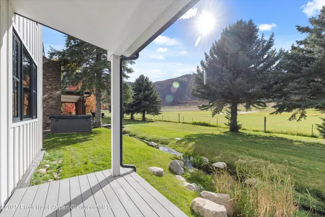 a view of a yard with an outdoor space