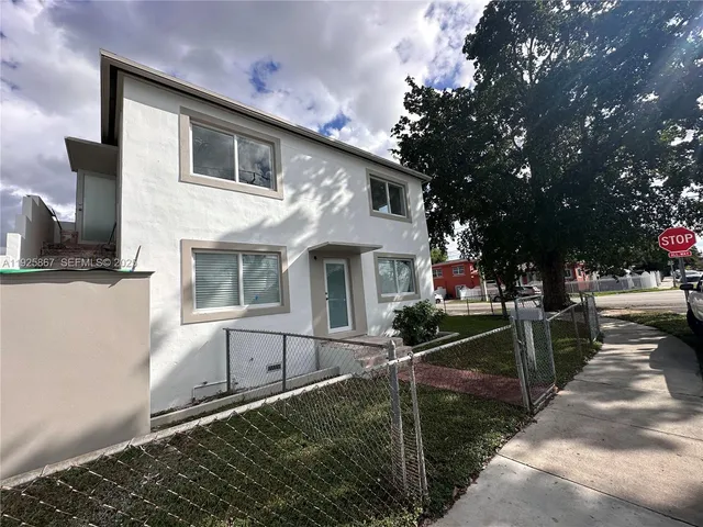 a front view of house with yard