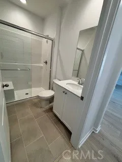 a bathroom with a sink and toilet