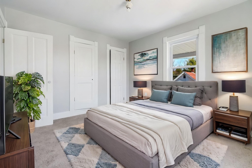 142 Spruce Street Winchendon, MA 01475 - Photo 11 of 34 a bedroom with a bed and a potted plant