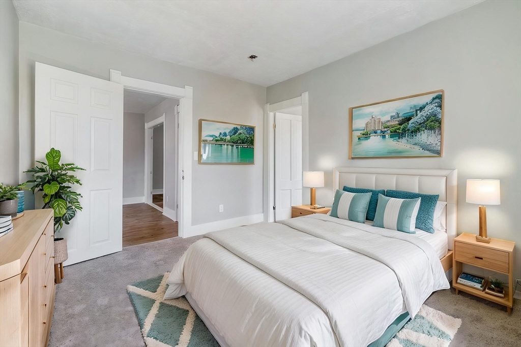 142 Spruce Street Winchendon, MA 01475 - Photo 13 of 34 a bedroom with bed and a potted plant