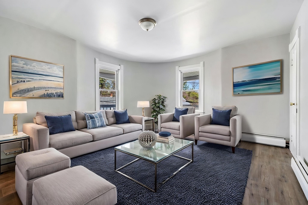 142 Spruce Street Winchendon, MA 01475 - Photo 20 of 34 a living room with furniture a rug and a window