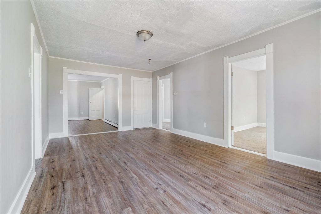 142 Spruce Street Winchendon, MA 01475 - Photo 21 of 34 an empty room with wooden floor and windows