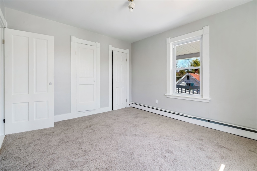 142 Spruce Street Winchendon, MA 01475 - Photo 29 of 34 an empty room with windows and closet