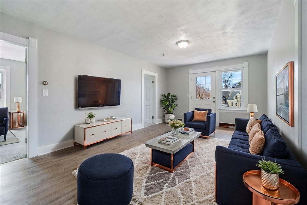 142 Spruce Street Winchendon, MA 01475 - Photo 32 of 34 a living room with furniture and a flat screen tv