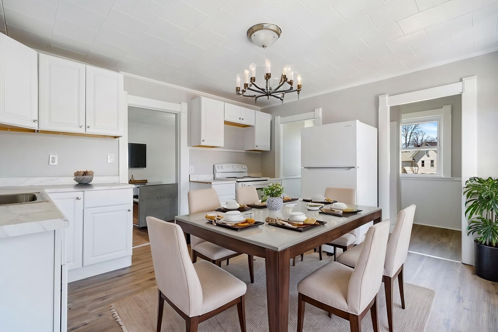 142 Spruce Street Winchendon, MA 01475 - Photo 7 of 34 a view of a dining room with furniture kitchen and chandelier