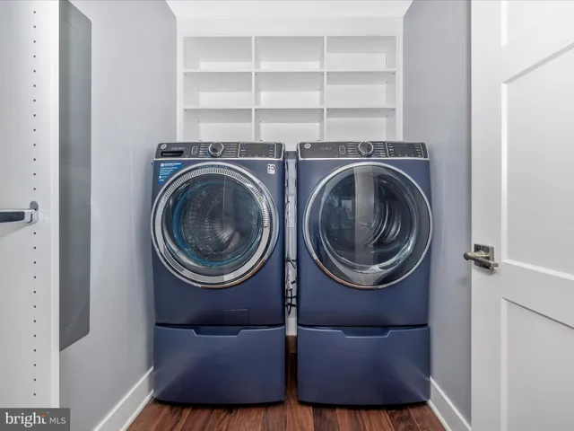 a view of room with wooden floor