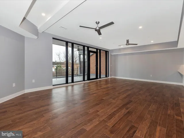a view of a kitchen with a stove and a sink
