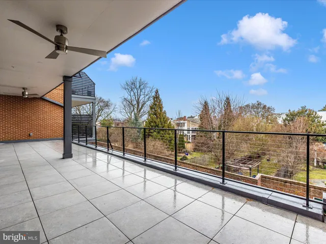 a view of empty room with a fireplace