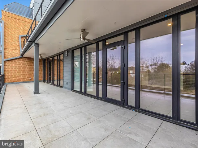 a city street lined with buildings and cars