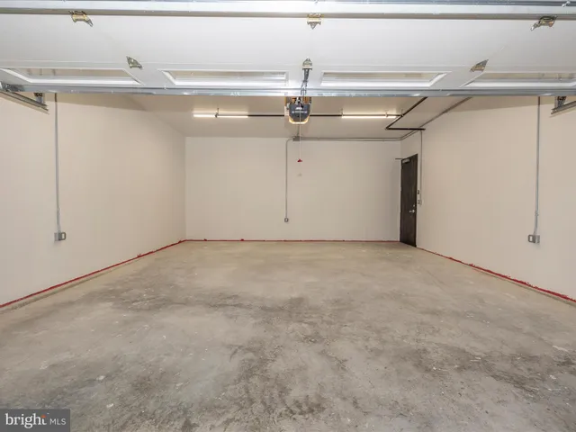 a view of path along with retail shop and buildings