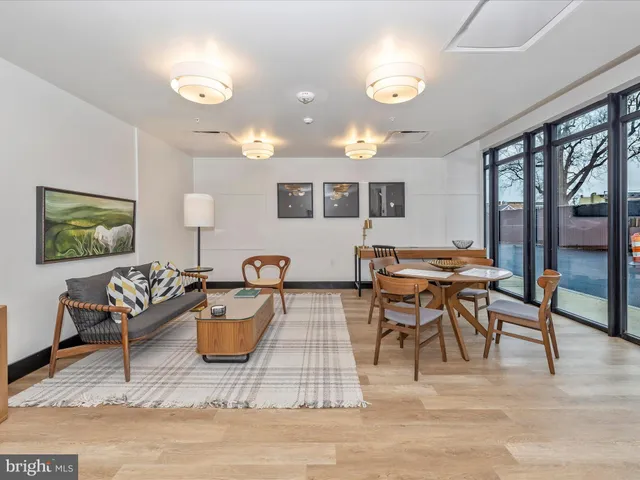 a view of a lake with houses in the background