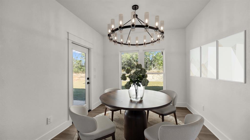 225 Jefferson Way Weatherford, TX 76088 - Photo 16 of 35 a view of a dining room with furniture window and outside view