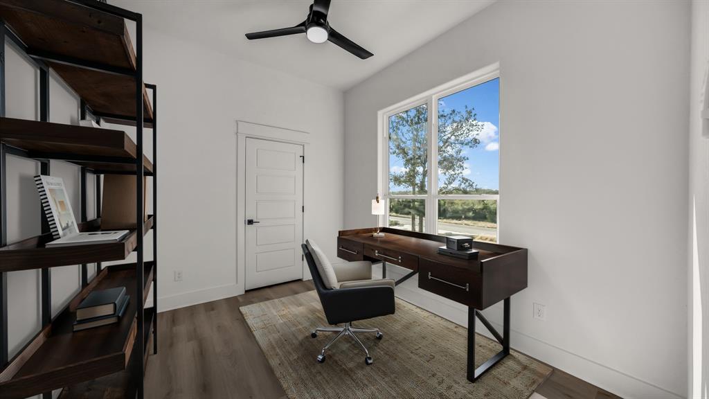 225 Jefferson Way Weatherford, TX 76088 - Photo 19 of 35 a living room with furniture and a window