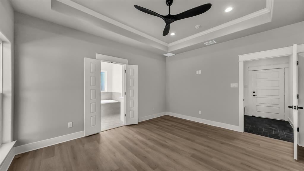 225 Jefferson Way Weatherford, TX 76088 - Photo 22 of 35 wooden floor in an empty room