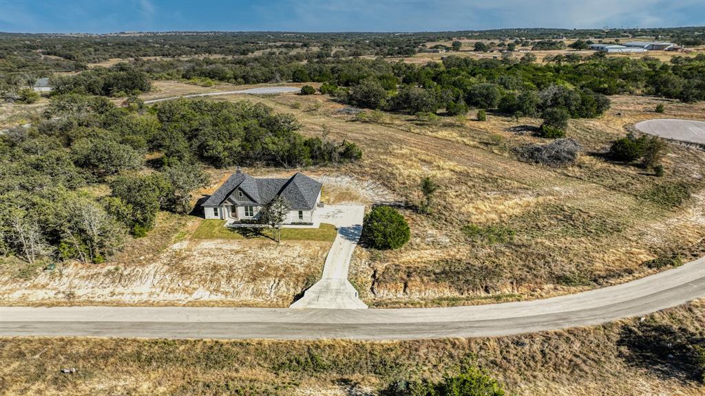 225 Jefferson Way Weatherford, TX 76088 - Photo 31 of 35 a view of a yard with wooden fence