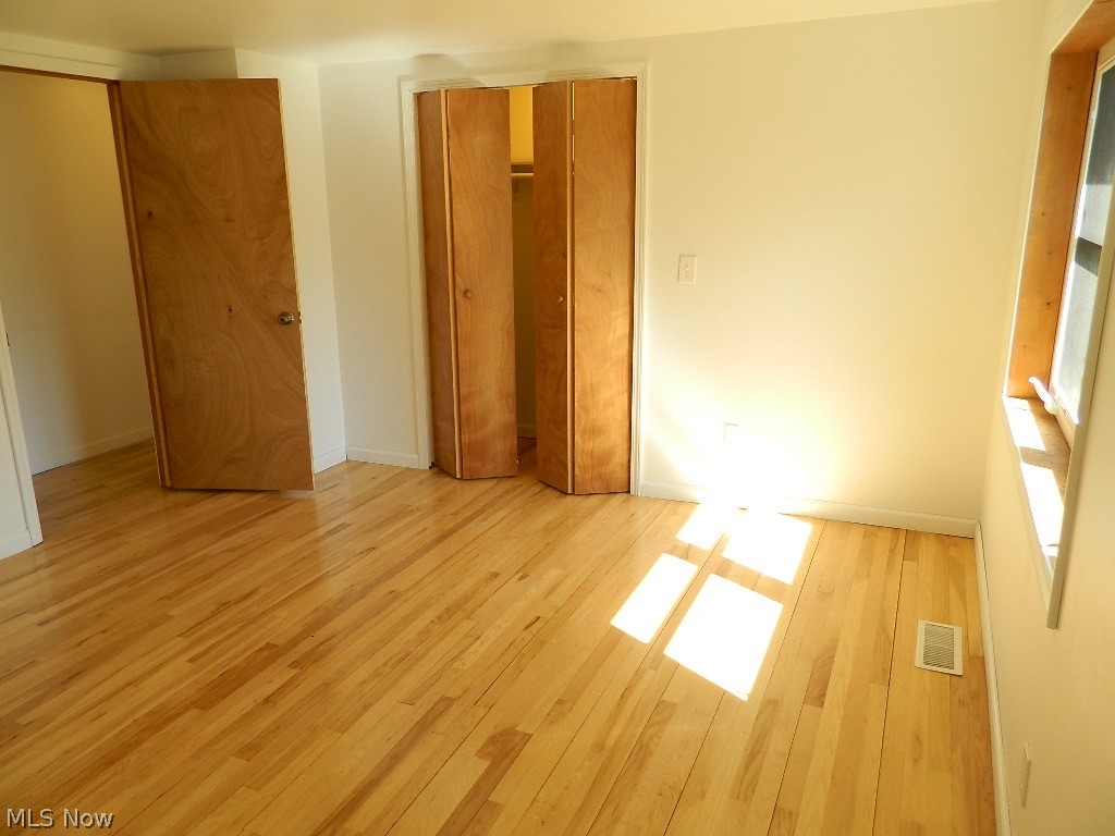 9772 Chardon Road Chardon, OH 44024 - Photo 25 of 35 BR #3 Lighted Closet View and Beautiful Hardwood Floors in Every Bedroom!