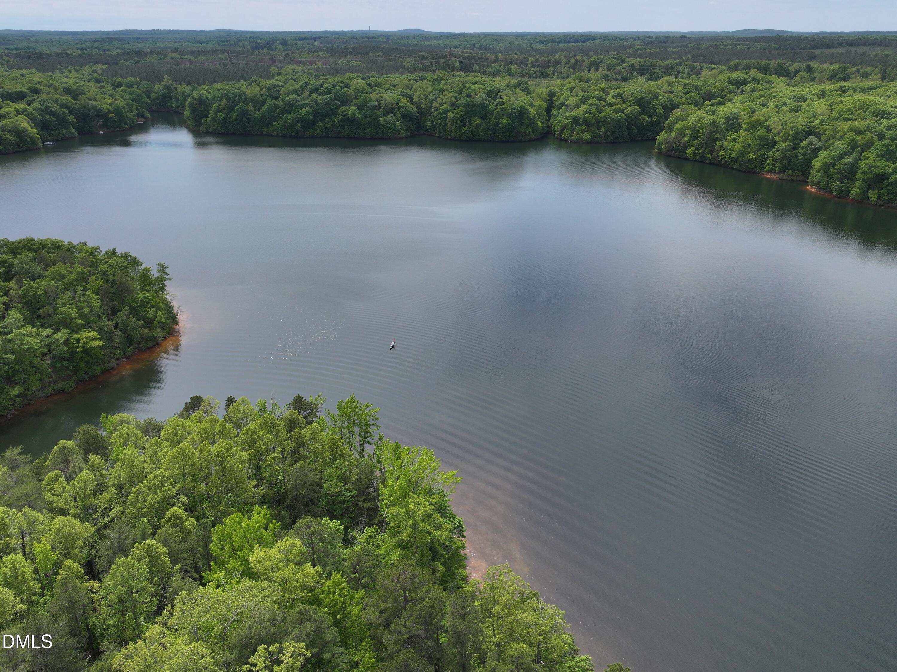75 Max Finn Lane Roxboro, NC 27574 - Photo 15 of 17 an aerial view of a residential houses with lake view