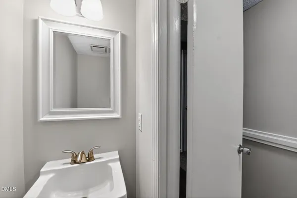 a bathroom with a sink and a vanity
