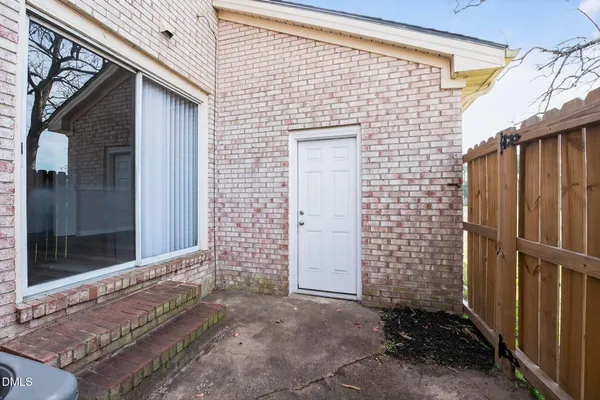 a view of house with wooden door