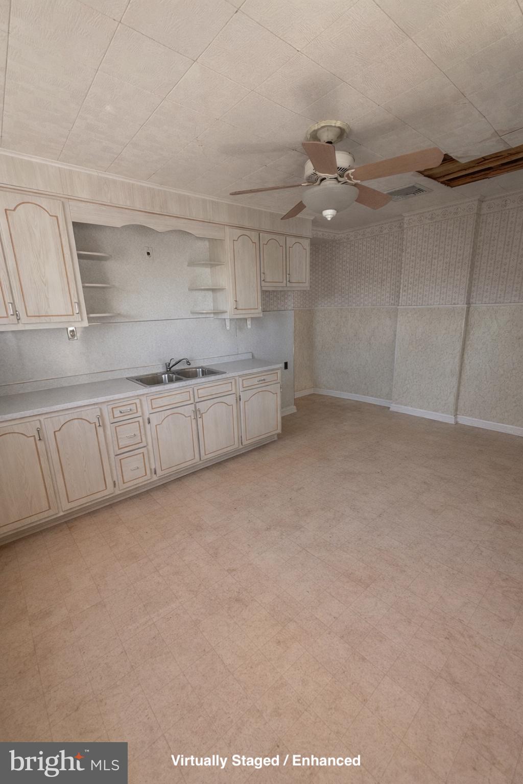 935 Easton Road Hellertown, PA 18055 - Photo 14 of 29 a view of a kitchen with cabinets and wooden floor