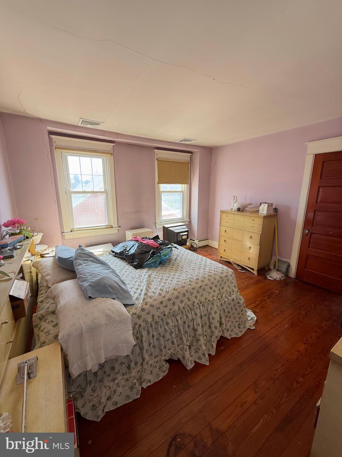 935 Easton Road Hellertown, PA 18055 - Photo 22 of 29 a bedroom with a bed and wooden floor