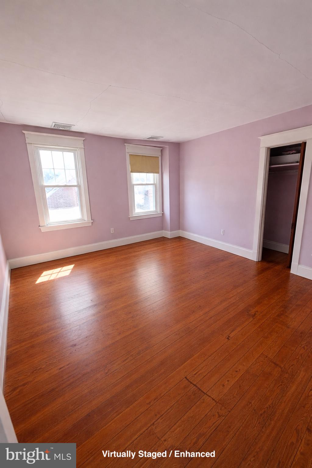 935 Easton Road Hellertown, PA 18055 - Photo 23 of 29 an empty room with wooden floor and windows