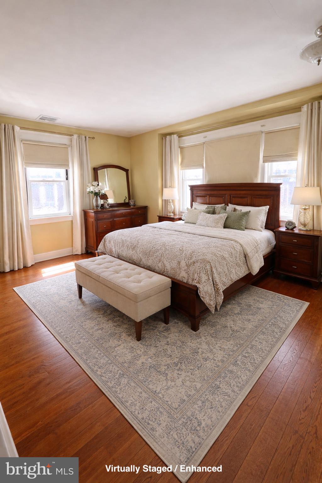 935 Easton Road Hellertown, PA 18055 - Photo 27 of 29 a spacious bedroom with a bed lamp closet and window