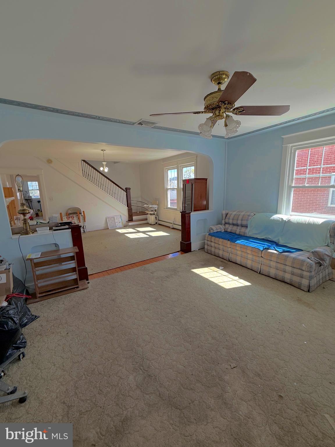 935 Easton Road Hellertown, PA 18055 - Photo 5 of 29 a living room with furniture and a chandelier