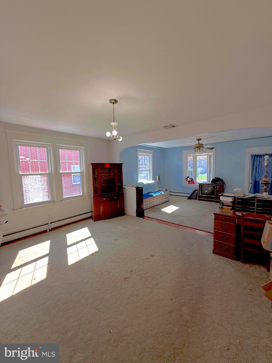 935 Easton Road Hellertown, PA 18055 - Photo 9 of 29 a living room with furniture and a chandelier