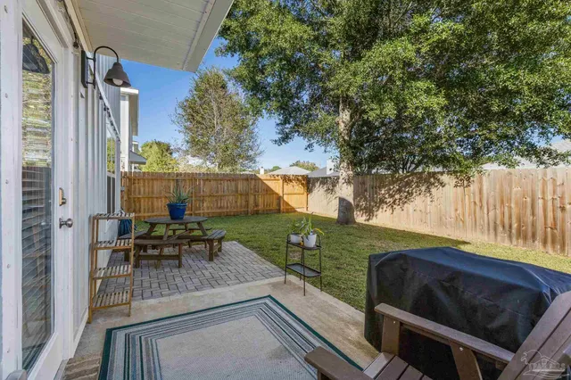 a view of outdoor sitting area with furniture