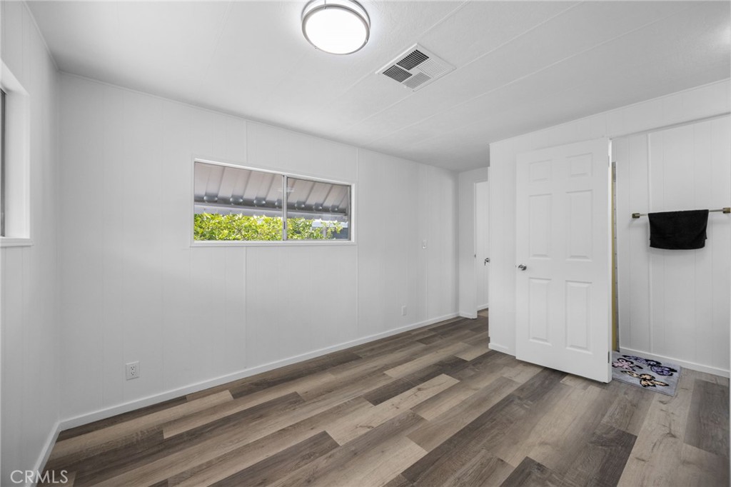 995 Pomona Road, Unit 88 Corona, CA 92882 - Photo 19 of 31 a view of room with window and ceiling fan