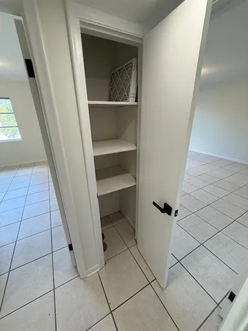 a view of an empty walk in closet