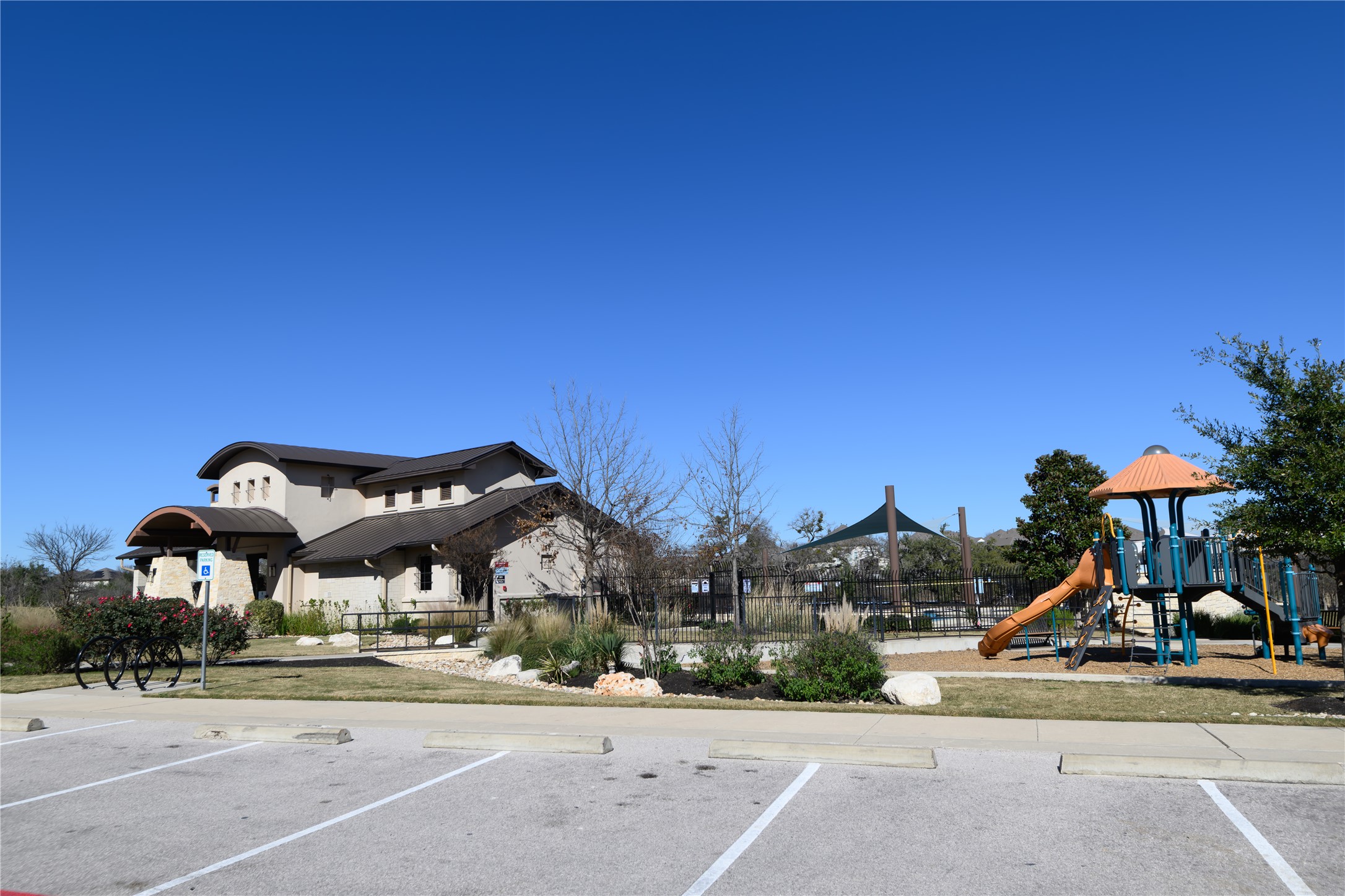 316 Morning Ridge Georgetown, TX 78628 - Photo 2 of 9 a view of a street with of cars parked on the roadside
