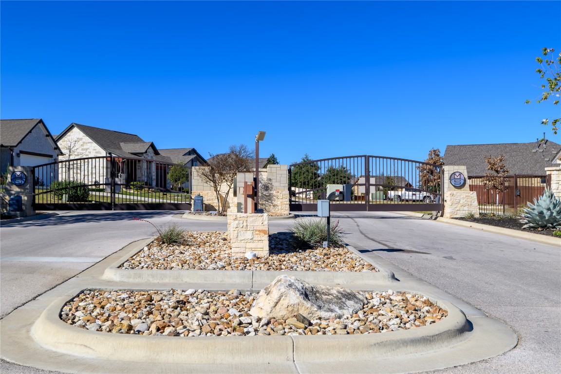 316 Morning Ridge Georgetown, TX 78628 - Photo 3 of 9 a view of a street with a building in the background