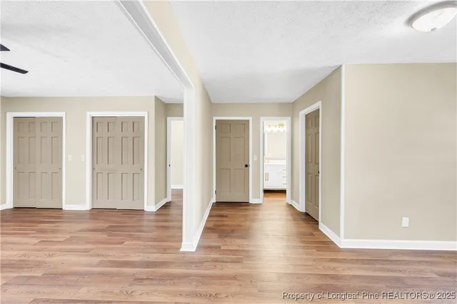 a view of a livingroom with wooden floor